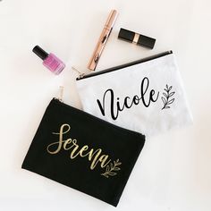 two personalized makeup bags sitting on top of a white table next to each other