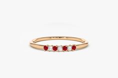 "Ruby and Diamond Wedding Band in 14k Gold / Stackable Genuine Ruby Ring / July Birthstone / Rose Gold and White Gold Features ✔Made to Order ✔Gold Kt: 14K ✔Available Gold Color: Rose Gold, Yellow Gold, White Gold ✔Gemstone: Genuine White Diamonds ✔Round Cut Diamond: 3 Pcs 1.5MM ✔Round Cut Ruby: 4 Pcs 1.5MM ✔Number of Stones: 7 ✔Stone Size: 1.5MM ✔Total CTW: 0.11 ✔ Diamond Color-Clarity: G Color SI Clarity ✔Ready to Ship in 7-10 Days ★ ★ ★ Each order will be beautifully packaged for gift giving Yellow Gold Multi-stone Diamond Ring For Wedding, Yellow Gold Multi-stone Diamond Wedding Ring, Wedding Multi-stone Yellow Gold Diamond Ring, Red Wedding Rings With Single Cut Diamonds, Red Single Cut Diamond Wedding Rings, Birthstone Band, Ring Rosegold, Wedding Ring For Her, Ruby Diamond Rings