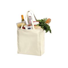 a grocery bag filled with food and drinks on top of a white table next to a bottle