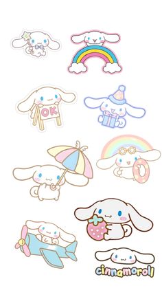 some stickers that are on the side of a white sheet with animals and rainbows