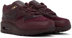 Low-top paneled suede and grained leather sneakers in burgundy. · Lace-up closure · Textile logo patch at padded tongue · Padded collar · Swoosh appliqué at sides · Logo embossed at heel counter · Air Sole unit at rubber midsole · Treaded rubber outsole Please note that this item may be shipped only within North America. Supplier color: Crush/Burgundy