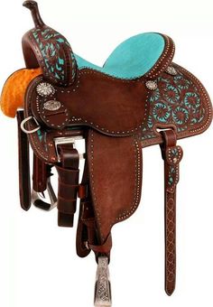 a brown and blue saddle with turquoise accents