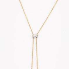 This striking makes quite an iconic statement with diamonds in the center and on the ends of the bars. It hangs beautifully on anyone’s neck and is great with a v shape or rounded neckline. We had one client buy this necklace for their wedding dress. Casual or dressy this necklace is a show stopper! The chain is solid 14 karat yellow gold and the diamonds are all set in 14 karat white gold to show off the diamonds. The details for this beautiful necklace are listed below:Metal Quality: 14K Yello Luxury Diamond Cut Chain Necklace For Wedding, Luxury Wedding Chain Necklace With Diamond Cut, Classic Diamond Cut Chain Necklace For Wedding, Luxury Wedding Chain Necklace With Diamond Accents, Elegant Lariat Chain Necklace For Evening, Elegant Evening Lariat Chain Necklace, Timeless Lariat Necklace For Weddings, Diamond Cut Chain Necklace For Wedding, Elegant Diamond Cut Chain Necklace For Formal Occasions