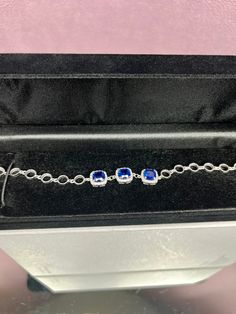 "NEW Fine Genuine Jewelry Blue Cushion Cut Sapphire Halo Bracelet (sale price valid until 12/26/2021) Three large cushion cut royal blue sapphires 3.00ct  .925 Sterling Silver  Gemstones are lab created L 8.25\" (in.)  Adjustable bracelet Packaged in royal blue velvet jewelry box Step into sophisticated style with this exquisitely elegant bracelet. A touch of bling... changes everything. ALL of my jewelry products are 100% genuine.  I purchase all my fine jewelry from trusted independent jeweler Halo Bracelet, Bracelet Packaging, Blue Cushions, Elegant Bracelet, Sapphire Bracelet, Wedding Jewelry Bracelets, Cushion Cut, Wedding Bracelet, Adjustable Bracelet