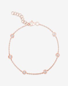 Elegant bezel-set diamond bracelet, available in two sizes in yellow, white, or rose gold. Rose Gold Diamond Bracelet With Adjustable Chain, Adjustable Chain Rose Gold Diamond Bracelet, Rose Gold Diamond Bracelet With Bezel Setting, Station Bracelet, Bezel Set Diamond, Bezel Diamond, Bezel Setting, Or Rose, Yellow White