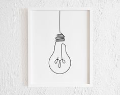 a black and white drawing of a lightbulb hanging from a wire on a wall