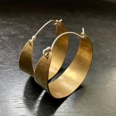 These sweet, wide brass hoops make great "every day" earrings. Hammered and oxidized, sterling ear wire fits into hole in back of hoop to close. Small - around 3/4" diameter Medium - 1 1/2" diameter Large - a little over 2" diameter Hammered Brass Earrings, Hammered Metal Jewelry, Brass Jewellery Handmade, Brass Hoop Earrings, Hammered Hoop Earrings, Hammered Earrings, Brass Hoops, Hammered Metal, Large Hoop Earrings