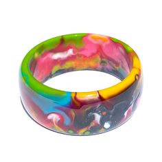 Chunky bangle bracelet with colorful marbled design 2.5"D Made from colored resin Note: Each piece is handmade and one-of-a-kind. Patterns and coloring will vary Free shipping! Designed in South Florida and made in Brazil. Artsy Multicolor Bangle Jewelry, Multicolor Hand Painted Bangle Jewelry, Hand Painted Multicolor Bangle Jewelry, Adjustable Resin Bangle, Multicolor Hand Painted Bangle, Multicolor Wearable Art Bangle Bracelets, Multicolor Hand Painted Bangle Bracelet, Multicolor Hand Painted Bangle Bracelets, Hand Painted Multicolor Bangle