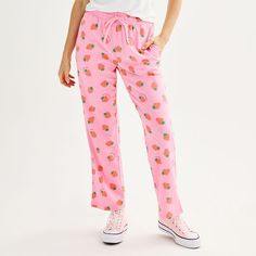 Any Strawberry Shortcake fan would love these juniors' pants! Any Strawberry Shortcake fan would love these juniors' pants! FEATURES Straight hem Drawstring elastic waistband No closure - pull-on styling 2 side pockets Jersey constructionFIT & SIZING High rise sits below the natural waistline Relaxed fit through the hip and thigh 30-in. inseam 18 1/2-in. leg opening Straight leg openingFABRIC & CARE Cotton, polyester Machine wash and tumble dry low Imported Size: X Large. Color: Pink. Gender: fe Lovecore Fashion, High Neck Tank Top, No Closure, High Neck Tank, Print Pants, Boyfriend Tee, Bottom Clothes, Printed Pants, Strawberry Shortcake