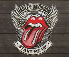 the rolling stones sticker on a wooden wall with words harley davidson start me up