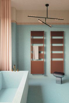 a bath room with a tub and a sink