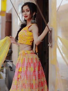 This exquisite ensemble features a yellow color organza lehenga adorned with digital print work, sequins, and thread embroidery work, creating a contemporary and elegant look. The similar color slub silk choli is embellished with sequins, thread embroidery work, and mirror work, adding a touch of glamour to the outfit. Completing the look is a similar color organza dupatta with sequins and thread embroidered work, along with a designer lace borderwork for a stylish finish.
The semi-stitched lehe Yellow Organza Dress For Navratri, Designer Yellow Choli With Gota Work, Semi-stitched Yellow Choli With Gota Work, Yellow Anarkali Blouse With Gota Work, Yellow Choli With Cutdana For Festivals, Yellow Cutdana Choli For Festivals, Festive Yellow Choli With Cutdana Details, Festive Yellow Choli With Cutdana, Summer Festive Organza Lehenga