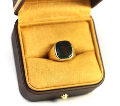 What a unique signet ring, with a natural Heliotrope Gemstone or as most call it a Bloodstone Ring. Known for its healing properties as well as bringing respect and luck.  - Size: 9 unisex  - 10K Yellow Gold  - Bezel Setting  - With noticeable red markings.  - Weight: 7.83 grams  - Circa: 1950's  - Condition- Shows some wear but will be polished, the gemstone is more of a matte finish like most bloodstone gemstones.  - For more info please DM! Bloodstone Ring, Signet Rings, San Antonio Tx, Healing Properties, Signet Ring, Bezel Setting, San Antonio, Favorite Jewelry, Jewelry Rings