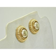 Gorgeous classic baroque glass pearl carved gold-plate Chanel -inspired clip back earrings w/ comfort backs.  Signed :" Givenchy, Paris, New York" From my private collection of over 40 years that was secured in protected environment, never worn.  ill be submitting many Fabulous pieces of costume jewelry... Look out for my beauties to behold and wear.  Great health your way~~~ Pristine...    Due to the unique nature of this product, all sales are final. This item is not eligible for the standard Classic Cabochon Clip-on Earrings For Formal Occasions, Formal Gold Pearl Drop Clip-on Earrings, Gold Cabochon Earrings For Anniversary, Antique Gold Pearl Earrings For Evening, Classic Cabochon Clip-on Earrings For Formal Events, Classic Gold Baroque Earrings, Classic Formal Clip-on Earrings With Cabochon, Classic Baroque Pearl Earrings For Formal Occasions, Classic Formal Clip-on Cabochon Earrings