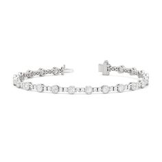 A testament to our vision of harmonizing luxury and simplicity. This tennis bracelet features a continuous line of round diamonds laid out in a pattern of one alternating bezel-set round diamond and a duo of claw prong-set round diamonds. The bracelet's understated design showcases the unparalleled fire and brilliance of the most popular diamond shape. Diamond White Tennis Bracelet With Bezel Setting, Classic Round Tennis Bracelet With Bezel Setting, Timeless Round Channel Set Bracelets, Timeless Round Diamond Bracelet Channel Set, Timeless Round Diamond Bracelet With Channel Set, Classic Tennis Bracelet With Bezel Setting, Timeless Diamond Bracelet With Bezel Setting, Timeless Round Channel Set Bracelet, White Gold Channel Set Diamond Bracelet