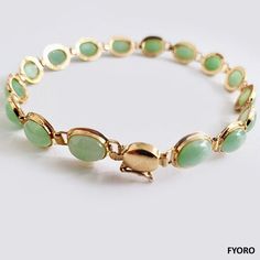 The 'Tibetan Spring Jade Bracelet' takes inspiration from the tallest mountain range in the world. Where the peaks of Jade are counter-balanced by the valleys, portrayed by the Gold links. This Spring Jade variant portrays Winter-Spring, with the frosted tips of the Himalayas showing white exteriors housing the luscious green. Each bead represents one of the tallest 16 Himalayan mountains, housed in Tibet. Symbolizes concentrated power and dignity Materials: 4.80g 14K Gold, 2.40g Jade Dimensions: 190 x 6.5 x 4 mm Gross Weight: 7.20 g Luxury Gold Jade Bracelets, Luxury Jade Bracelets For Formal Occasions, Luxury Formal Jade Bracelets, Jade Accessories, Frosted Tips, Himalayan Mountains, Jade Bangle, The Himalayas, Jade Bracelet