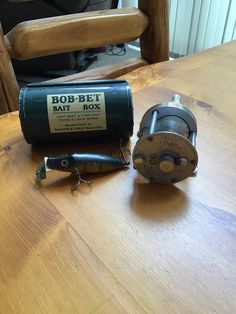 an old bob - bee box next to a new one on a wooden table