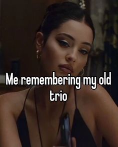 a woman holding a cell phone with the words merembering my old trio on it