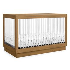 a wooden crib with clear glass in the top section and bottom section, against a white background