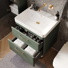 a bathroom with a sink and toilet in it