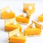 pumpkin pie cheese and crackers on a white background with the words pumpkin pie cheese and crackers