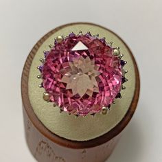 Large 37.68 carat shocking pink topaz 14k solid gold Vintage Ring is surrounded by a small halo of diamonds. The ring size is 5.5. Ring Size: 5.5 Total Weight: 20.7 grams Precious Metal: 14k yellow gold Precious stones: -Topaz Center Stone: 37.68 carats, 21mm -White Round Diamonds: 0.5 carats Hallmark: 14K Pink Topaz Center Stone Ring For Anniversary, Luxury Pink Topaz Ring In Classic Style, Luxury Pink Topaz Ring For Formal Occasions, Luxury Pink Round Topaz Ring, Luxury Pink Topaz Ring, Gold Vintage Ring, Gold Ring Vintage, Shocking Pink, Platinum Diamond Rings