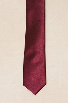 Say hello to our Mens Max Tie, now available in a luxurious wine satin fabric. Just in time for fall weddings. The self-tie style allows for a comfortable fit every time. Perfect for any occasion, this tie is sure to elevate your look. Maroon Tie, Burgundy Tie, Wedding Vision, Tie Men's, Brown Suits, Fall Weddings, Red Tie, Wedding Ties, Tie Styles