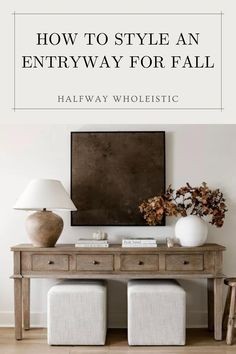 an entryway table with two white stools next to it and the words how to style an entryway for fall