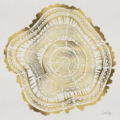 a gold and white painting on paper with an abstract design in the middle, it looks like