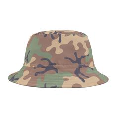 First, it protected fishermen from rain in the 1900s. Now, the Army Camo bucket hat is making its way to the very top of fashion picks for all ages. Choose the seam lines, add your the bucket hat to your bucket list, and make your wardrobe staple come to life.  .: Material: 100% water resistant polyester .: Available in 2 sizes .: Two stitching color options to pick from .: Sewn-in label .: Proudly Made in the USA Camo Bucket Hat, Camping Hat, Army Camo, Gifts For Nature Lovers, Green Camo, Outdoor Adventure, Sew-in Labels, Nature Lover, Sun Protection