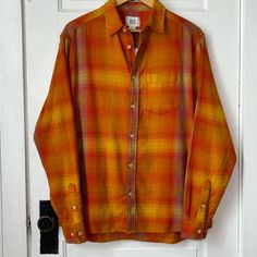 Bdg Oversized Orange Flannel With All Over Distressing. The Fabric Has A Worn Look To It. Definitely Could Be Unisex And Can Fit A Large Variety Of Sizes. Size Men’s Small Pro 23.5” L 28.5” Back 30” New With Tag Orange Outfit, Orange Yellow, Casual Shirts For Men, Casual Button Down Shirts, Mens Shirts, Man Shop, Orange, Yellow, Fabric