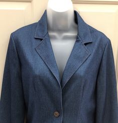 "Okay, this polyester blazer is awesome! It is faux denim in a stretchy polyester knit fabric. It is sized vintage 11/12, but by today's standards should fit a 6-8. See measurements below. This could be worn so many ways! The red stitching gives it western flare, but it also has a mod 70s vibe. I love it! It's in mint condition & hard to believe it's over 40 years old. Please note the vintage buttons ~ Remington Express 20GA. I've seen the buttons alone going for several dollars a piece. Sna Retro Denim Blue Outerwear With Button Closure, Denim Blazer With Button Closure, Button-up Denim Blue Blazer With Pockets, Dark Wash Button-up Blazer With Pockets, Vintage Blue Blazer With Button Closure, Pointelle Cardigan, Preppy Sweater, Light Knit, Denim Blazer