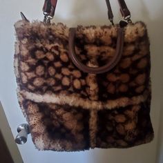 Coach Rogue Shearling Tote Bag. Strap Is A Replacement But Identical To The Original. No Flaws Designer Bags For Everyday Use In Winter, Luxury Faux Fur Shoulder Bag For Everyday Use, Luxury Faux Fur Bags For Everyday Use, Luxury Faux Fur Bag For Everyday Use, Luxury Faux Fur Rectangular Shoulder Bag, Luxury Rectangular Faux Fur Shoulder Bag, Brown Rectangular Bag With Faux Fur Lining, Brown Shopping Bag With Faux Fur Lining, Brown Bag With Faux Fur Lining For Shopping