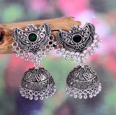 * Item  Description - * Material-  Silver plated oxidized earrings  * Weight -  25.20  Grams  * Inches -   1.7   Inches  * Length -  4.5 Centimeter  * Width -    2.0  centimeter  * Pattern -  Traditional wear, Party wear, Wedding gift, Daily wear, Casual wear, birthday gift, promise gift, gift for her,  Best price guaranteed  We strive continuously to serve our customers better and keep updating our shop with new designs regularly .  We can also supply in wholesale quantities. To enquire about w Bohemian Silver Dual-tone Earrings, Handmade Metal Drop Chandbalis, Festive Bohemian Dual-tone Earrings, Bohemian Drop Jhumkas In Metal, Dangle Chandbalis With Latkans In Metal, Dangle Metal Chandbalis With Latkans, Silver Metal Earrings With Meenakari, Metal Chandbali Danglers With Intricate Design, Bohemian Sterling Silver Drop Jhumkas