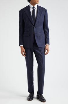 Pinstripes point up the precision tailoring of this structured suit cut from sumptuous wool in a single-breasted silhouette and framed with wide peaked lapels. Jacket has two-button closure; peaked lapels; four-button cuffs; chest welt pocket; front flap pockets; ticket pocket Trousers have zip fly with button-tab closure; front slant pockets; back button-welt pockets; adjustable waist Jacket is partially lined Trousers are unhemmed 100% wool Dry clean Made in Italy Designer Clothing Tailored Striped Double Breasted Suit For Business Casual, Tailored Striped Double-breasted Suit For Business Casual, Striped Fitted Double Breasted Suit For Work, Pinstripe Suits With Suit Collar For Work, Striped Double Breasted Suit With Notch Lapel, Notch Lapel Suits With Vertical Stripes For Business Casual, Elegant Pinstripe Double Breasted Suit For Work, Luxury Striped Suits For Office, Elegant Striped Double-breasted Suit For Office