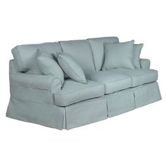 a light blue couch with two pillows on it's back and the arms folded down