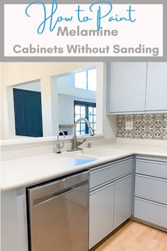 a kitchen with white cabinets and stainless steel dishwasher on the counter top is featured in this post about how to paint melamine cabinet without sanding