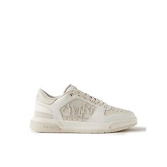 AMIRI upgrades traditional court sneakers with its signature iconography in this 'Classic Low' pair. Detailed with a staggered logo and signature star perforations, they have leather uppers, suede trims and stacked, two-tone rubber soles. Wear them with the label's jeans or track pants. Luxury High-top Sneakers With Perforated Toe Box, Luxury High-top Sneakers With Embossed Logo, Classic High-top Custom Sneakers With Embossed Logo, Luxury Sneakers With Perforations And White Sole, Luxury High-top Sneakers With Embroidered Logo, Luxury High-top Sneakers With Perforations For Streetwear, Luxury Sneakers With Perforated Toe Box For Streetwear, Luxury Sneakers With Embossed Logo For Streetwear, Luxury Custom Sneakers With Embroidered Logo And Round Toe