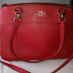 Like New- Never Used Classic Red Bag With Top Carry Handle, Classic Red Shoulder Bag With Top Carry Handle, Classic Red Shoulder Bag With Top Handle, Classic Red Satchel With Removable Pouch, Classic Red Bag With Handles, Classic Red Shoulder Bag For Errands, Chic Red Coach Bag, Classic Red Double Handle Bags, Formal Red Coach Shoulder Bag