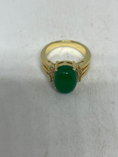 Vintage Lucky Green Nephrite Jade Gold Filled Cocktail Ring Large green nephrite jade gold filled Vintage ring, does not tarnish Size 5.5, 6, 7, 7.5, 8 All rings are shipped free in the US in a nice gift box. Check out our over a THOUSAND great reviews Engraving is $4 per letter and is not always perfect depending on the piece. It can take a few days if the jeweler is busy. This is payable to Paypal Judithsltd@gmail.com Gold Oval Chrysoprase Emerald Ring, Formal Gold Jade Rings, Fine Jewelry Gold Jade Rings, Gold Jade Rings In Fine Jewelry Style, Fine Jewelry Gold Rings With Jade, Gold Chrysoprase Ring, Formal Gold Emerald Chrysoprase Ring, Gold Formal Emerald Ring With Chrysoprase, Spiritual Green Open Ring