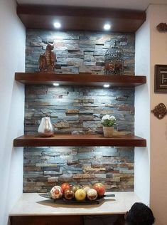 a kitchen counter with some fruit on it