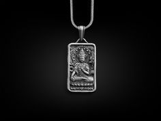 Buddha 925 Silver Engraved Necklace, Sterling Silver Buddha Jewelry, Buddha Art, Personalized Necklace, Spiritual Necklace, Memorial Gift These 925K Sterling Silver Buddha Spiritual Necklace photos are taken with original and every item has handmade engraving details.  It's very elegant and classy for everyday use and gives stylish look to your outfits. Also, can be preferred as a gift for friends and family for an eternal memorial. Dream collection has many meanings behind its background; we pr Silver Jewelry With Rectangular Coin Pendant, Silver Pendant Necklace For Commemoration, Symbolic Sterling Silver Necklace For Commemoration, Symbolic Sterling Silver Necklaces For Commemoration, Silver Necklace With Large Pendant For Commemoration, Silver Necklace With Coin Pendant, Handmade Pendant Necklace For Commemoration, Handmade Sterling Silver Necklace For Commemoration, Silver Necklace With Rectangular Pendant