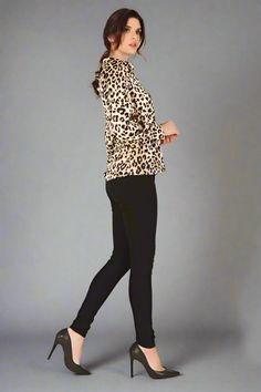 This leopard print blouse exudes luxury and sophistication. The soft, silky material provides a comfortable and stylish fit, making it a versatile addition to any wardrobe. With its eye-catching print this top is perfect for any occasion. Regular fit Long sleeves Material polyester Machine wash cold Model is 5'9" and wears US small S: 17.5" (Bust), 13.5" (Shoulder), 25.75" (Length), 21" (Sleeve Length) M: 18.5" (Bust), 14" (Shoulder), 26.25" (Length), 24.5" (Sleeve Length) L: 19.5" (Bust), 14.5" Chic Leopard Print Blouse For Fall, Stretch Leopard Print Blouse For Fall, Chic Leopard Print Tops For Night Out, Leopard Print Stretch Blouse For Spring, Elegant Leopard Print Blouse For Fall, Stretch Leopard Print Blouse For Spring, Leopard Print Long Sleeve Top For Work, Stretch Leopard Print Tops For Fall, Spring Leopard Print Stretch Blouse