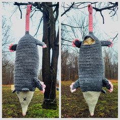 a crocheted stuffed animal hanging from a tree