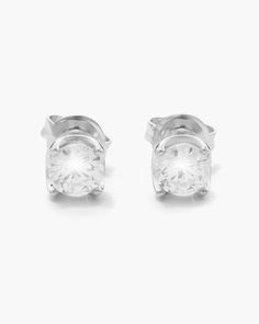 The classic choice to deck out your lobes is available from JAXXON. Our silver Classic Stud Earring features a 0.6ct handset diamond simulant in a silver crown setting. These brilliant lab-simulated diamonds reflect the light in all directions, giving you a perfectly polished and sleek look. These diamond look-alike studs serve as the perfect eye-catching capstone to a spectrum of different styles. Sold as a pair. Solid Gold Chains, Silver Crown, Diamond Simulant, Stud Earrings For Women, Silver Shop, Pendant Bracelet, Silver Man, Cz Stone, Silver Earrings Studs