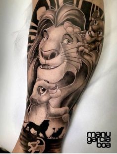 the lion king tattoo is shown on this man's arm