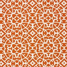 an orange and white background with intricate designs