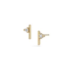 A dainty modern stud earring, the Andromeda mini studs are a fresh take on an everyday favorite. They're also a great addition to a curated ear in second or third piercings. Inspired by twinkling stars in the night sky, they are constructed of 14k gold and sold as singles. Shown on model with the Andromeda Hook, Stud and Double Stick earrings. ◆ Made to order ◆ Approximately 1/4" long ◆ Recycled 14k Gold ◆ Recycled Diamonds: 1.7mm (.04tcw) ◆ High polish finish Modern Yellow Gold Earrings With Si Clarity, Modern Si Clarity Yellow Gold Earrings, Stars In The Night Sky, Curated Ear, Space Jewelry, Stick Earrings, Twinkling Stars, Mini Studs, Twinkle Star