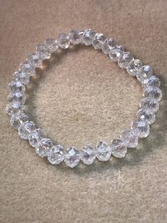 📌 Posted on Etsy : Crystal "Diamond" Clear Aurora Borealis Iridescent Faceted Glass Bead Stretch Br...  https://www.etsy.com/listing/269583501/crystal-diamond-clear-aurora-borealis?utm_campaign=crowdfire&utm_content=crowdfire&utm_medium=social&utm_source=pinterest Adjustable Iridescent Crystal Bracelet With Faceted Beads, Sparkling Round Beads Crystal Bracelet As Gift, Sparkling Round Beads Crystal Bracelet For Gift, Clear Crystal Bracelet With Round Faceted Beads, Sparkling Crystal Bracelet With Round Beads As Gift, Sparkling Crystal Bracelet With Round Beads For Gift, Adjustable Iridescent Crystal Bracelets, Adjustable Iridescent Crystal Bracelet, Crystal Stretch Bracelet With Faceted Beads