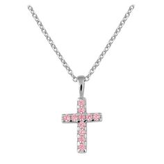 Made In USA! Lifetime Manufacturer Warranty For DefectsChildren's fine jewelry - This beautiful sterling silver necklace features a cross pendant accented with 11 pink or white cubic zirconia. The cross is on a 15 inches trace chain with lobster claw clasp. A delicate gift for girls from toddler to preteen for any special occasion such as christening, baptism or communion, etc. Age (Yrs): 2-16 (Age recommendation is approximate) Metal: 925 Sterling Silver Chain Type: Trace Chain Clasp: Lobster C Personalized Pink Sterling Silver Jewelry, Pink Birthstone Necklace In Sterling Silver, Pink Sterling Silver Cross Jewelry, Pink Cross Sterling Silver Jewelry, Pink Cross Pendant Jewelry As Gift, Pink Cross Pendant Necklace For Gift, Pink Cross Necklace For Gift, Pink Cross Necklace For Gifts, Pink Sterling Silver Birthstone Jewelry